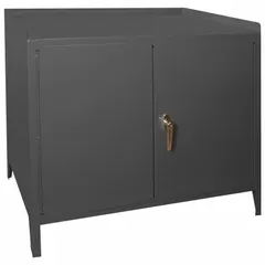 Fully assembled steel cabinet bench with shelves, measuring 36 in x 24 in and finished in gray. Overall load capacity of 1,200 lb. Includes a handle on the side for repositioning. Suitable for industrial workshops, maintenance areas, and assembly lines requiring a sturdy work surface with integrated storage.