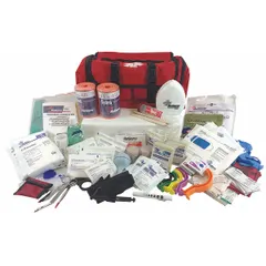 Red nylon duffel bag trauma kit containing 29 components including conforming gauze, CPR face mask, infection control kit, BZK wipes, alcohol prep pads, alcohol gel, and SOF tourniquet. No medication included. Suitable for emergency medical response in industrial environments.