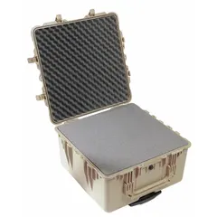 This PELICAN protective case features interior dimensions of 24 in x 23 3/4 in x 12 7/8 in and includes convoluted, pick and pluck, and solid foam layers for customizable cushioning. The telescoping handle and double-throw case closures facilitate transport and secure sealing. Rated IP67, it protects contents from dust and temporary water immersion, suitable for shipping or field use of sensitive equipment.