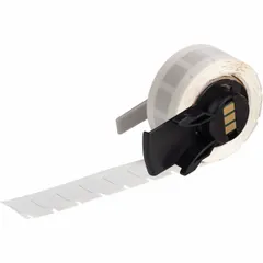 Precut label roll for industrial identification and labeling of wires, cables, or small components. Made of polyimide with a white gloss finish, resistant to heat and chemicals. Compatible with BMP61 printer series.