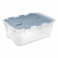 This plastic storage tote features a clear body for quick visual identification of contents and a blue attached lid. The two-piece lid design allows easy access while keeping contents secure. Stacking capable for efficient use of vertical space in warehouses, workshops, and industrial facilities