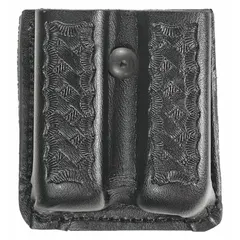This duty equipment pouch is constructed from synthetic leather with a basket weave texture. It measures 3 1/2 inches by 7/8 inches and features an open closure for quick access. Designed for magazine storage, it is suitable for use by security and tactical personnel.