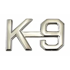 This metallic rank insignia is constructed of silver metal and measures 1/2 in. It features a clutch pin attachment for secure fastening to uniform collars or lapels. The insignia is designated F.D. and is supplied as a single pair. Typical use includes identifying rank or role on uniforms in fire service and emergency response settings.