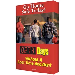 Electronic safety scoreboard with aluminum construction, nominal sign size 28 in x 20 in, and mounting holes for wall installation. Operates on 110/120V AC and is controlled via remote control. Displays a 'Go Home Safe Today! ___ Days Without A Lost Time Accident' message to track workplace safety milestones.