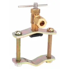 This brass self-piercing saddle valve is designed to tap into copper or brass tubing without cutting the line. It fits tube diameters from 3/8 in to 1 3/8 in and has a maximum pressure rating of 150 psi. Commonly used on refrigeration, water, or air lines to add a service port or branch connection.