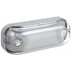 This plastic surface-mount emergency light is rated for wet locations, suitable for areas exposed to moisture such as loading docks and parking garages. It features two halogen lamp heads with 7W each and provides 14W emergency backup on 120V AC input. The gray housing is made of plastic, and the unit is not remote capable.
