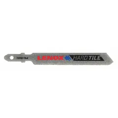 This LENOX jigsaw blade features diamond grit on a carbon steel body with a T shank, designed for cutting acrylic and tile materials. With an 89 mm blade length, it is suitable for precision cuts in tile and masonry work. The single-pack blade can also be used for thin metal applications.