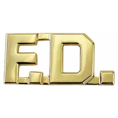 This metallic rank insignia features a 1/2 in gold metal construction with a clutch pin attachment for secure fastening to uniform collars or lapels. It is commonly used to display departmental designations on public safety or service uniforms.