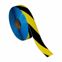 This PVC floor marking tape features a black/yellow striped pattern for high-visibility safety warnings. With a 32 mil thickness, it is suited for marking aisles, hazards, and storage zones in industrial environments