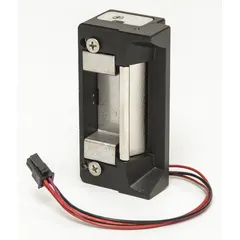 Cylindrical electric strike for access control systems, constructed of stainless steel. Measures 4 7/8 in height and operates on 12/24V input voltage. Rated as Heavy Duty (Performance Duty Rating 1) for high-traffic door applications. Used with cylindrical locksets to release the latch when energized, enabling remote or card-based entry.