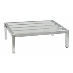 Welded aluminum dunnage rack with natural silver finish, measuring 12 in x 60 in x 18 in. Supports up to 2,000 lb and includes cap feet. Used for staging and transporting parts, coils, or heavy components in manufacturing and warehouse environments.