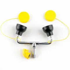 Spray head yoke assembly with dust covers, including an eyewash head. Designed as a replacement part for emergency eyewash stations combined with a shower. Suitable for use in industrial facilities, laboratories, and other locations requiring emergency safety equipment.