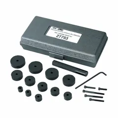 Bushing driver set designed for installing and removing bushings in vehicle suspension and chassis components. Includes multiple driver heads and adapters to accommodate various bushing sizes. Suitable for use in automotive repair and maintenance applications.