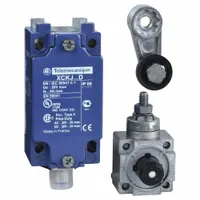 Roller lever-arm limit switch from the XCKJ series with a 60 mm mounting hole vertical center-to-center distance and a 90° operating head. Equipped with a 5-pin M12 connector for electrical connection. Used in industrial automation to detect the presence or position of moving machinery parts, such as on conveyors, packaging lines, and machine tools