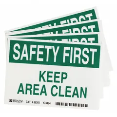 Polyester adhesive sign with 'Safety First: Keep Area Clean' messaging. Nominal size 3 1/2 in x 5 in, 0.01 in thick. Not retroreflective, does not glow in the dark, no anti-slip surface. Supplied in a 5-pack for indoor use on clean, dry surfaces to promote housekeeping and safety in industrial areas.