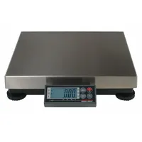 This shipping scale has a 150 lb capacity with readability of 0.05 lb/0.02 kg. It features a 12 in deep stainless steel weighing surface and an RS-232 interface for data communication. The remote indicator allows flexible placement for operator convenience. Typical applications include weighing parcels and packages in logistics, warehouses, and shipping departments