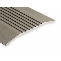 Aluminum saddle threshold, 4 ft long, with a fluted transition type. Used to seal the gap under doors and provide a smooth transition between different flooring surfaces or heights in commercial and industrial door openings