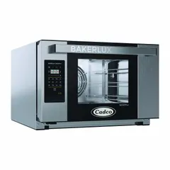 This half-size countertop convection oven operates at 1440 W and includes three wire shelves. It is suited for baking, roasting, and reheating in commercial kitchens, catering operations, and industrial break rooms.