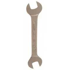 This nonsparking wrench is made from aluminum bronze with a natural finish. It features double-ended open jaws with 70 mm and 75 mm head sizes, and an overall length of 18 3/4 inches. Designed for use in environments where flammable gases, vapors, or dusts are present.