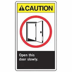 Vinyl adhesive sign with caution message 'Open This Door Slowly.' Measures 5 in x 3 1/2 in nominal size, 0.02 in thick. Not retroreflective, does not glow in the dark. Suitable for indoor use on smooth surfaces to warn of potential hazards behind doors.
