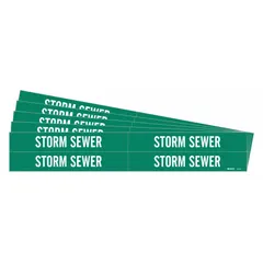 Green pipe marker with white legend reading 'Storm Sewer' without arrows. Fits pipe outer diameters from 3/4 to 2-3/8 inches. Each pack contains 5 markers. Adhesive backing for application on clean pipe surfaces to identify storm sewer lines.