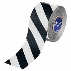 Polyester-backed floor marking tape with black/white striped pattern. 22 mil thickness for heavy-traffic areas. Used for marking aisles, hazards, and restricted zones in industrial facilities, warehouses, and plants.