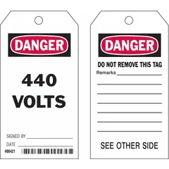White polyester tags printed with 'Danger/440 Volts' and 'Do Not Remove This Tag' in English. Each pack contains 10 tags with a cable-tie fastener. Used for electrical hazard identification and lockout/tagout procedures.