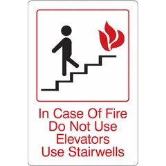 Acrylic adhesive sign with nominal size 9 in x 6 in. Not retroreflective and does not glow in the dark. Used to direct building occupants to stairwells during a fire emergency.